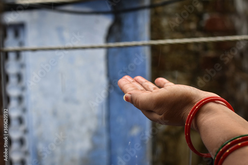 indian woman enjoy first monsoon in india, Indian Monsoon  