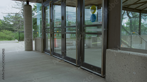 High quality picture of a closed glass doors on the subway or train station. GO transit in Canada.