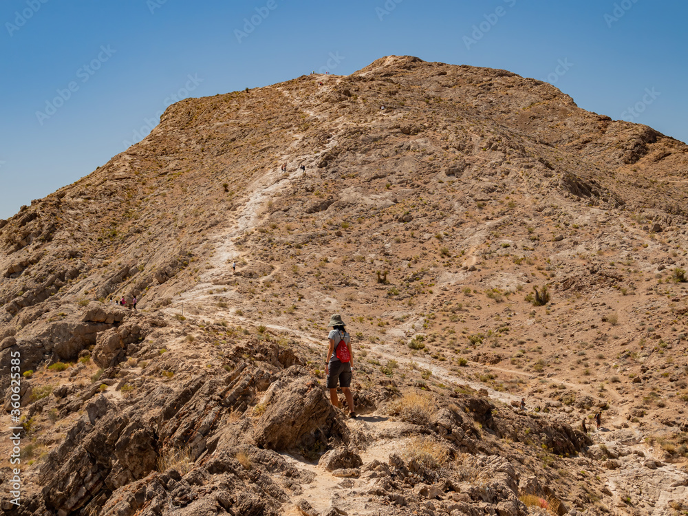 Woman hiking in Lone Mountain