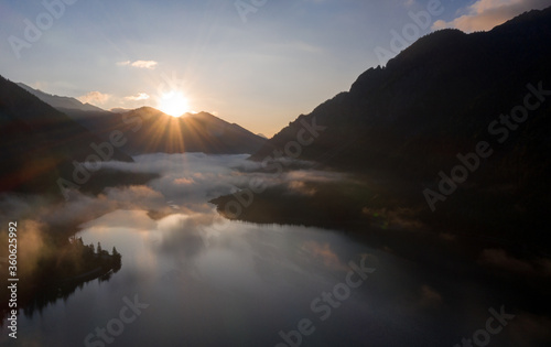 Sonnenaufgang über dem Plansee mit Nebel / sunrise at Mountain Lake (Plansee) in tyrol