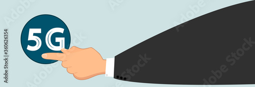 The hand presses the 5G button