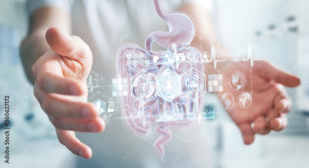 Man using digital x-ray of human intestine holographic scan projection 3D rendering Man using digital x-ray of human intestine holographic scan projection 3D rendering