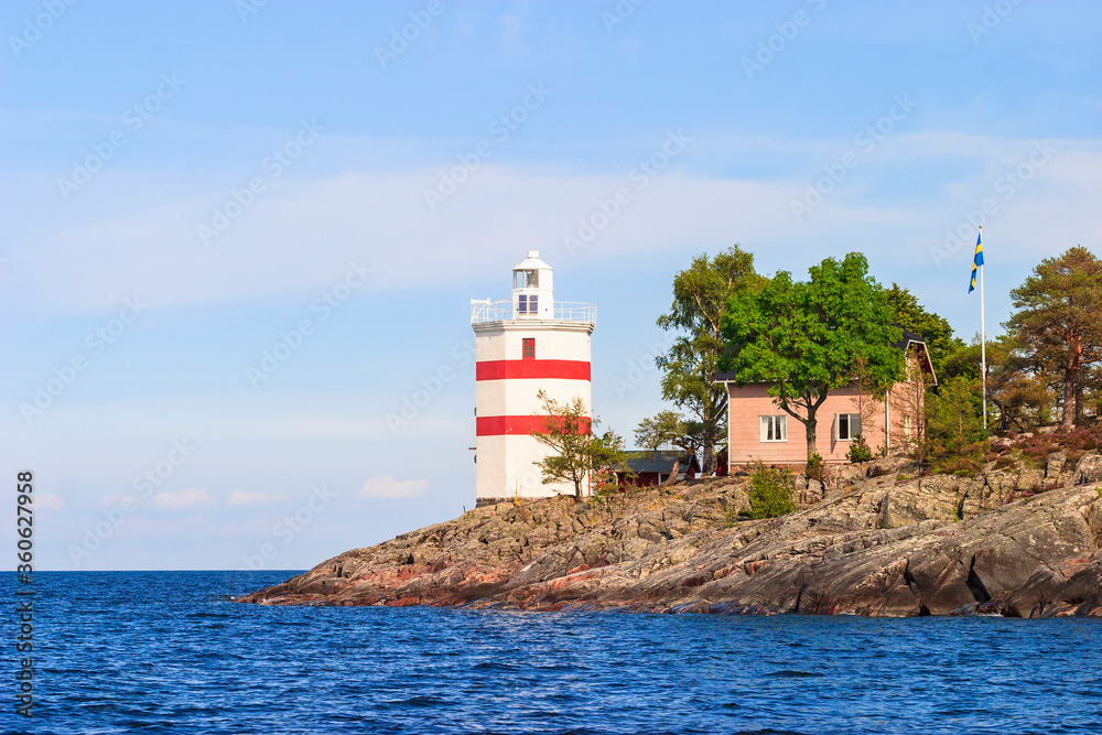 Luro lighthouse on a rocky island in Lake vanern in Sweden