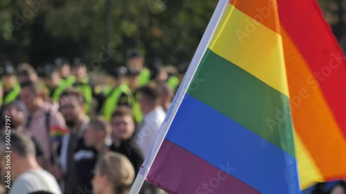 Rainbow Flag LGBTQ blur crowd in background photo