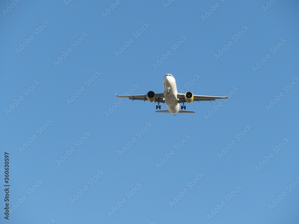 Beautiful photo of a plane landing at the airport taking land Beautiful photo of a plane landing at the airport taking land