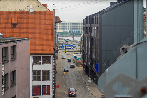Architecture of Old town of Riga, Latvia. View of road with cars from above. Modern exterior.