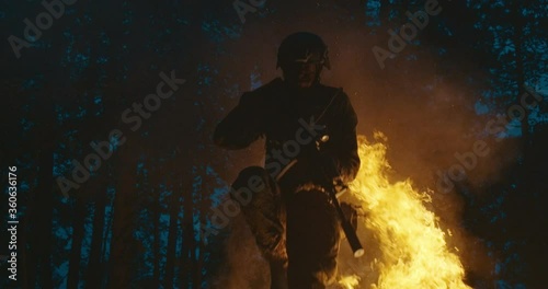 Soldiers of the elite special purpose units in forest at night