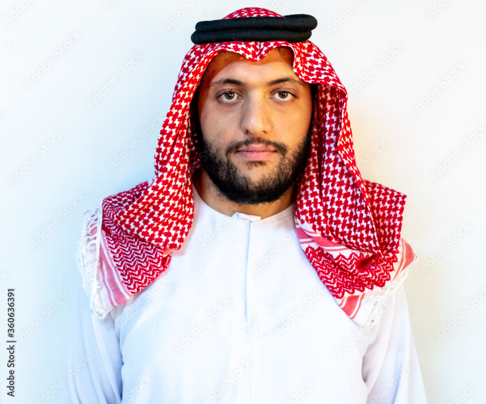 Arabic man standing alone with white background Arabic man standing alone with white background