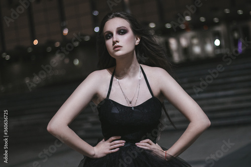 young woman in black dress