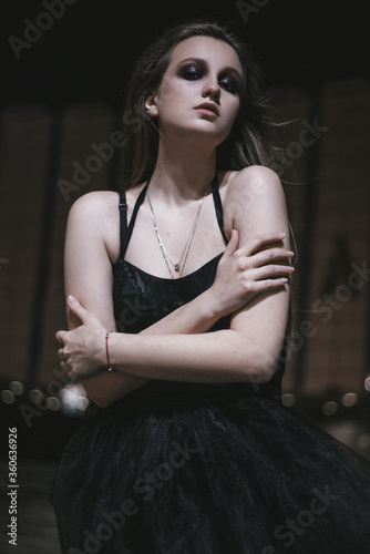 young woman in black dress