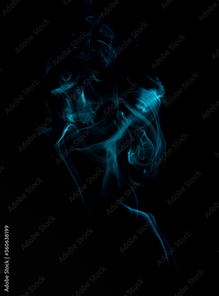 A realistic shot of a wisp of smoke against a black background - great for a cool background A realistic shot of a wisp of smoke against a black background - great for a cool background