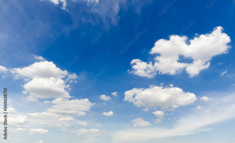 beautiful blue sky and white fluffy cloud horizon outdoor for background.