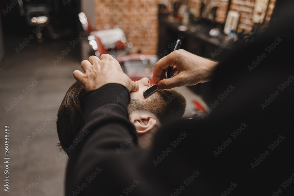 Beard shaving process in barbershop