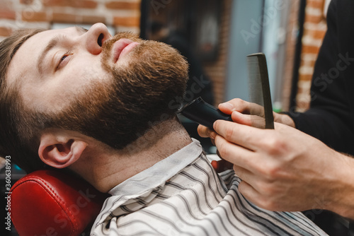 Barber master cuts beard to a brutal guy