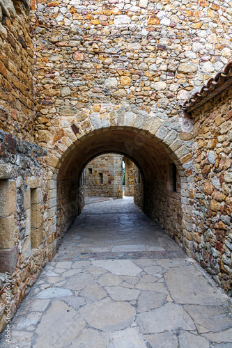 Castle de Pals  historic stone walls and arches  Pals  Spain