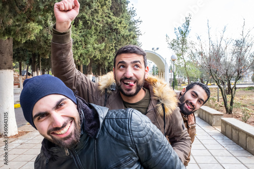 Happy arabic friends enjoying their time at university