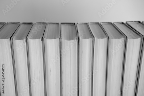Books in a row on a white background