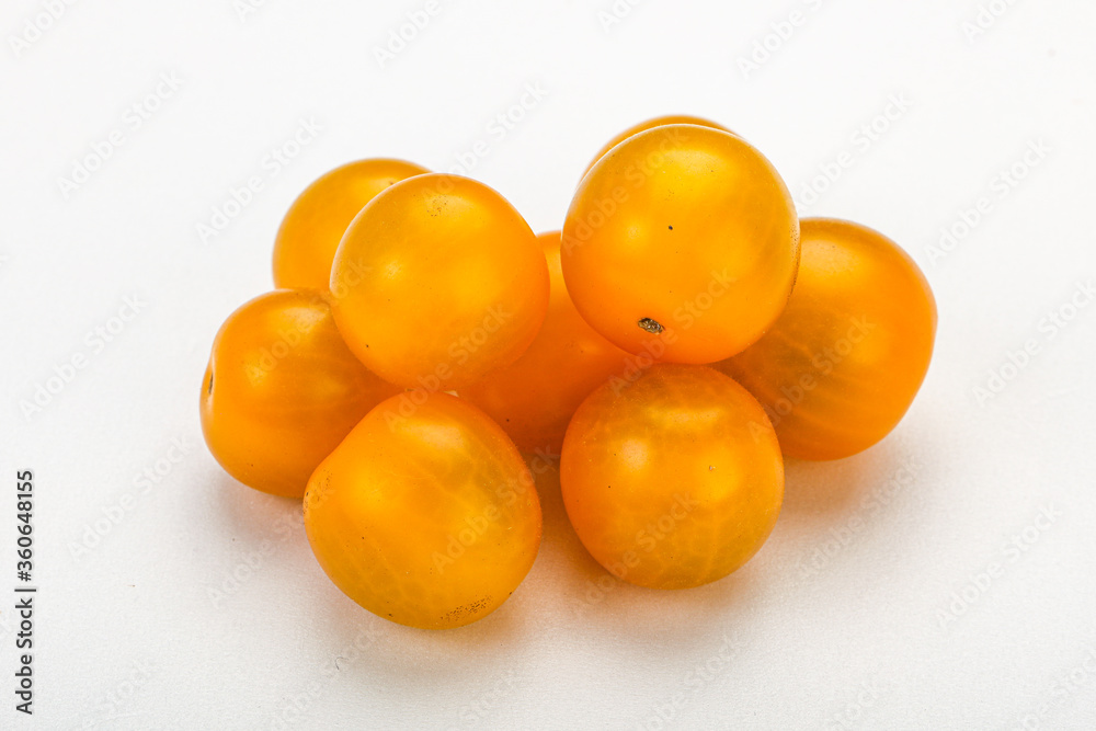 Fresh yellow cherry tomato heap Fresh yellow cherry tomato heap