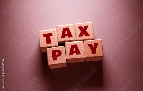 Tax Pay Word with Wooden Cubes