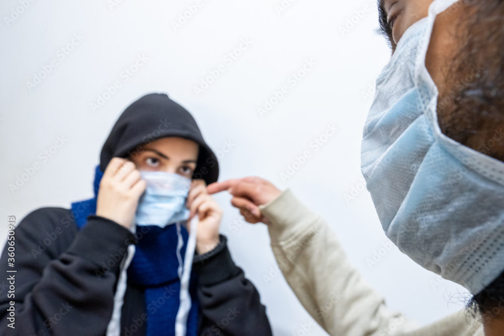 muslim woman and muslim man wearing medical mask
