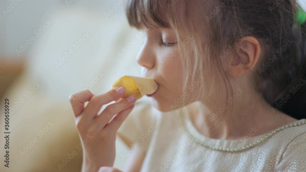 Little girl eating waffle-cup ice cream Little girl eating waffle-cup ice cream