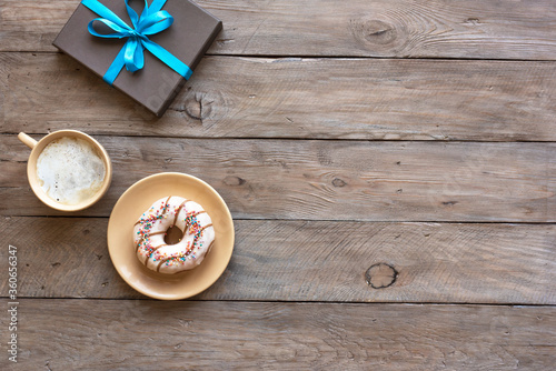 Coffee, donut and gift box