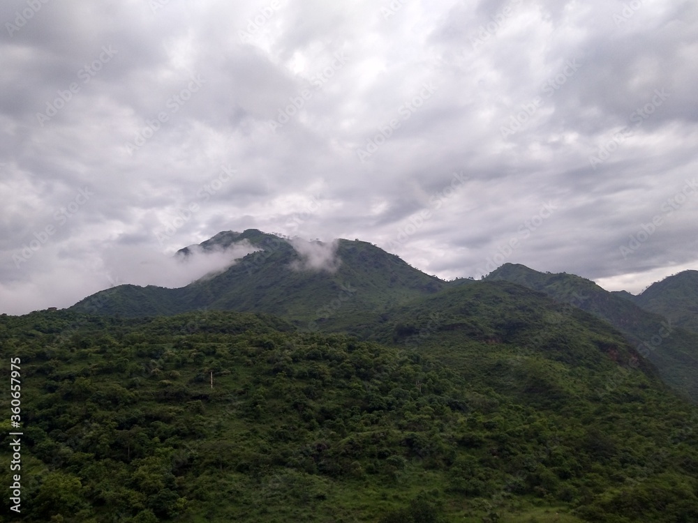 Cloudy mountain tip in monsoon