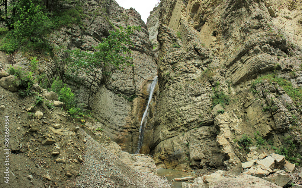 Azerbaijan. Beautiful waterfall high in the mountains.
