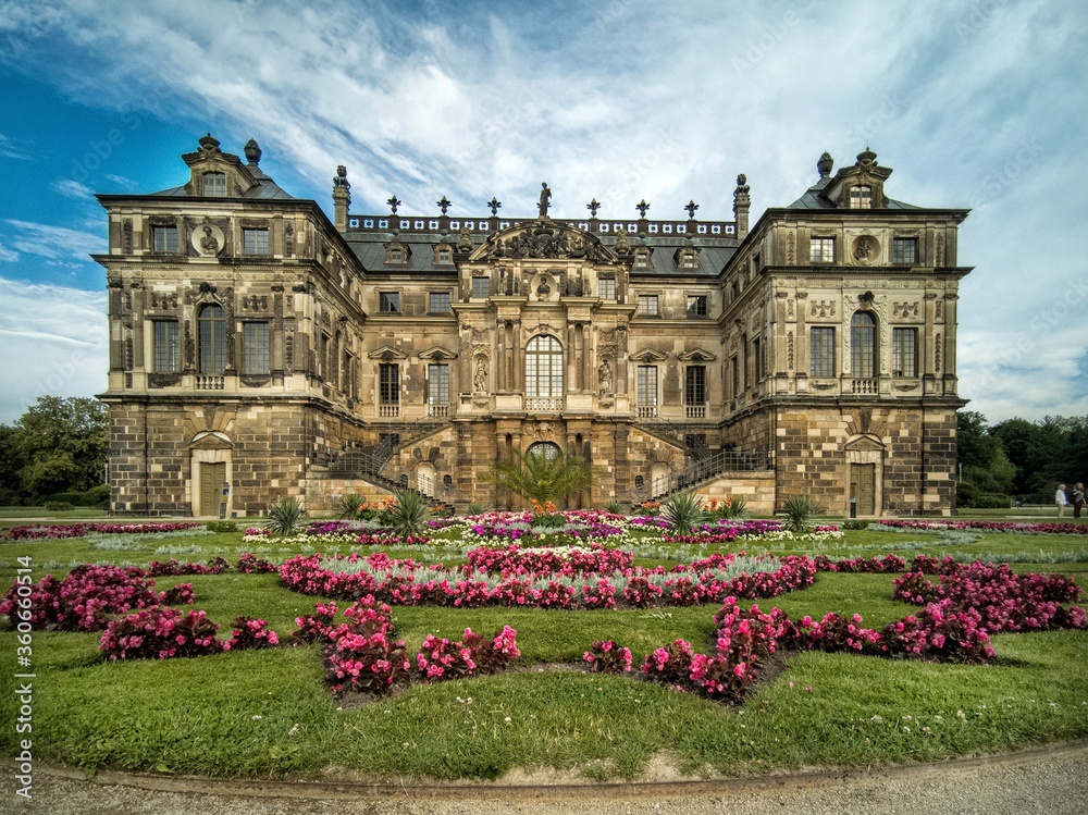 Castle located in the grossen garten - Dresden (Germany) with its colorful flower garden.