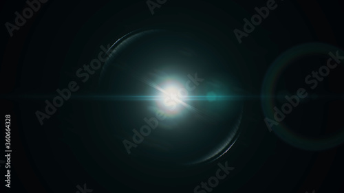 Anamorphic lens flare from a photo camera lens. Anamorphic background.