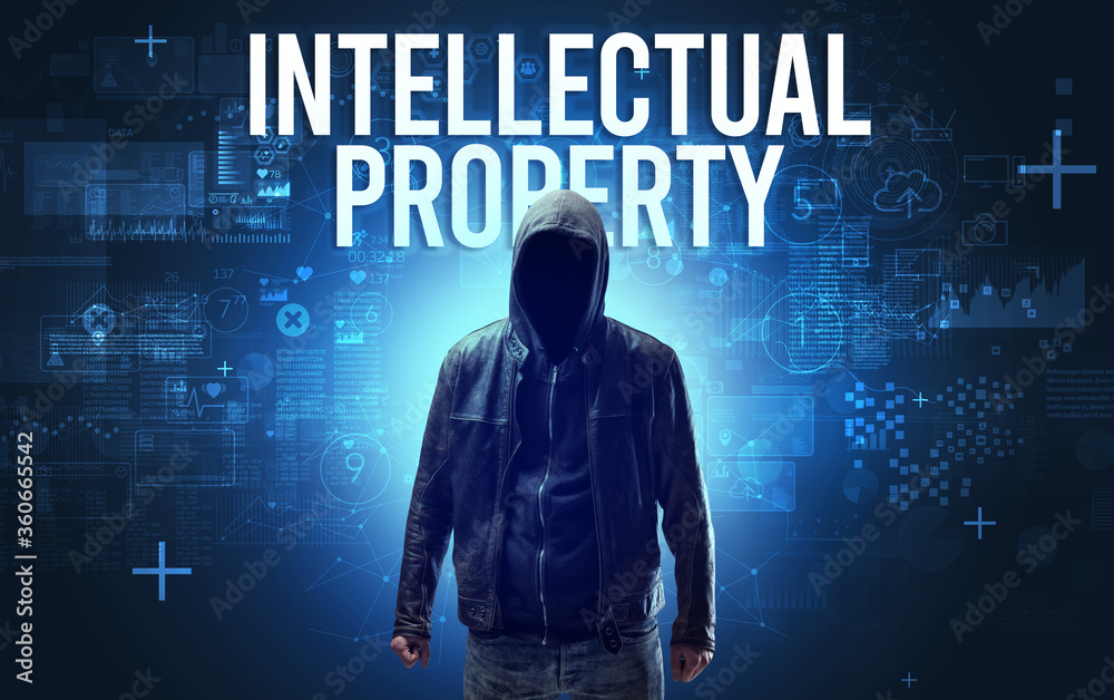Faceless man with INTELLECTUAL PROPERTY inscription, online security concept Faceless man with INTELLECTUAL PROPERTY inscription, online security concept