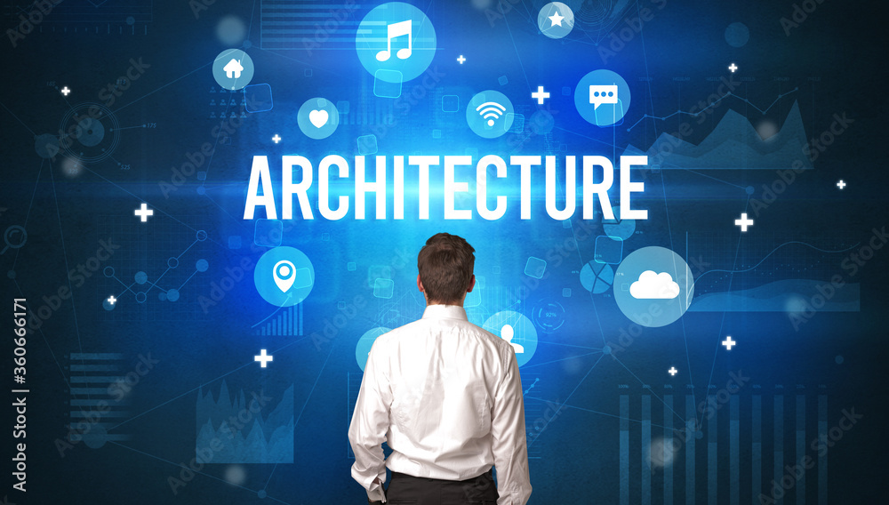 Rear view of a businessman with ARCHITECTURE inscription, modern technology concept Rear view of a businessman with ARCHITECTURE inscription, modern technology concept