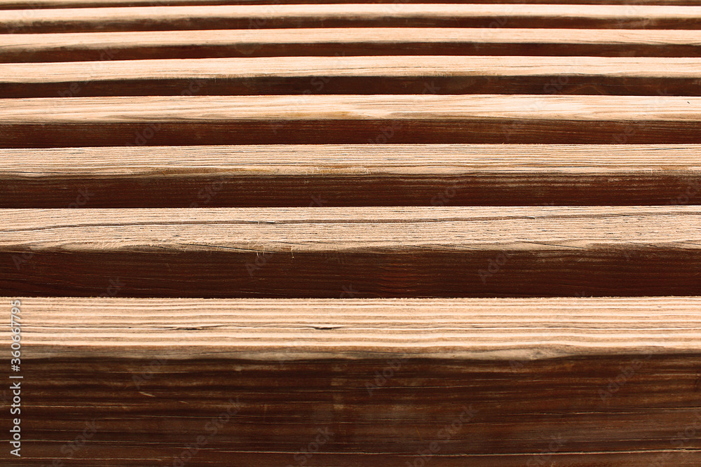 Stacked brown wood planks Stacked brown wood planks