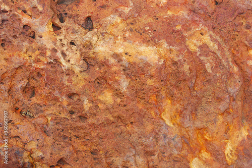 Pattern on red brown laterite stone
