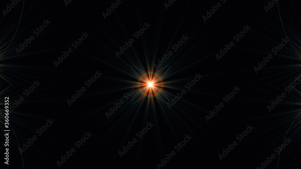 Beautiful lens flare with rays on a black background.