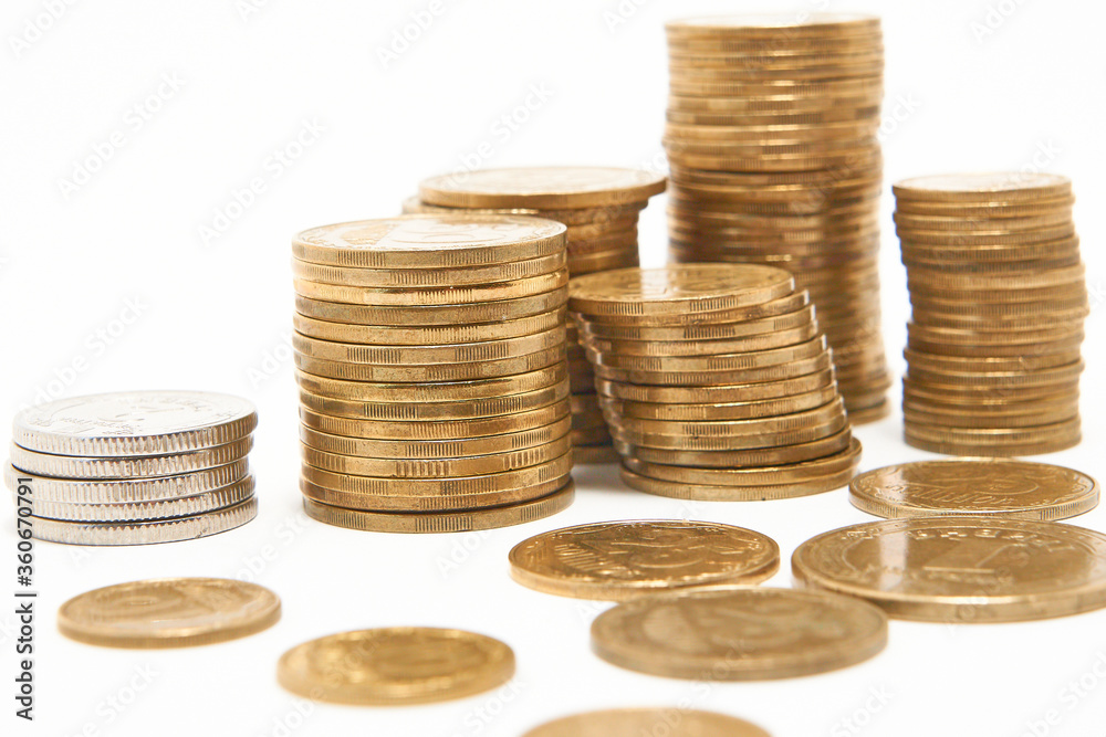 Stacks of coins on a white background. Stacks of coins on a white background.