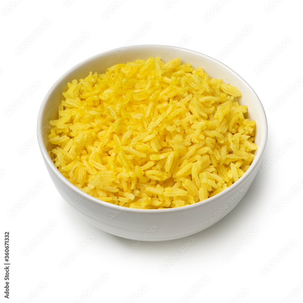 Bowl with yellow turmeric rice Bowl with yellow turmeric rice