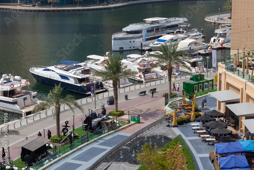 Another luxury part of Dubai is Dubai marina and million dollar valued yachts are parked there. Walking path, palm trees and restaurants are next to the river.