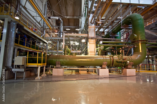 Daytime general view of the process pipelines for the supply of water and steam. General view of the process pipelines. General view of the pipes.