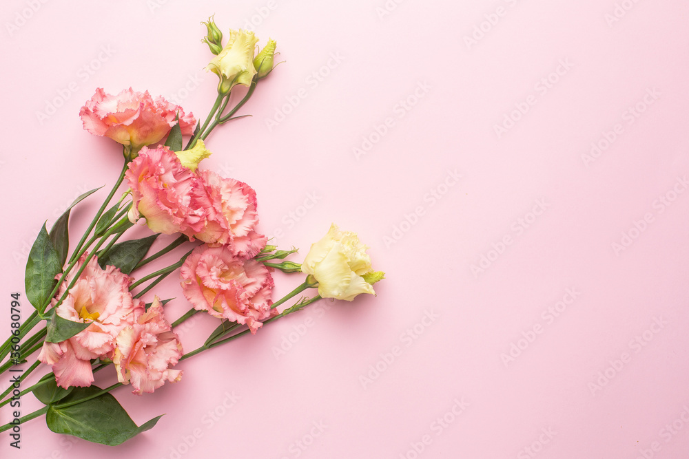Beautiful pink flower bouquet on pastel background with copyspace. Holiday and love