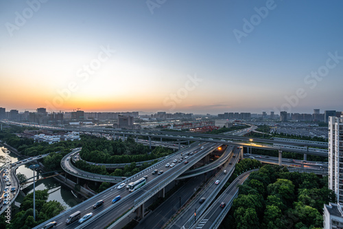 busy traffic road with city skyline in hangzhou china