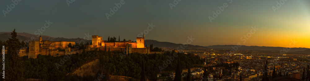 Evening wide angle view of the Alhambra and a slice of the city of Granada