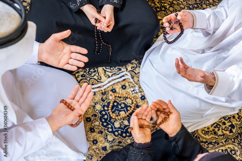 Arabic muslim family praying for god