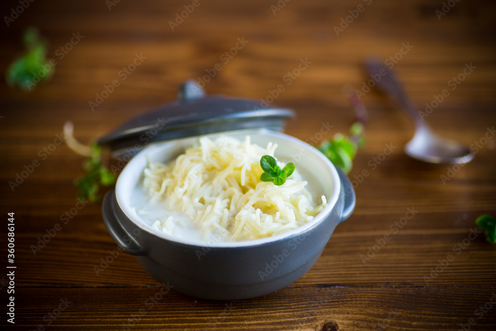 sweet boiled vermicelli with milk in a ceramic bowl sweet boiled vermicelli with milk in a ceramic bowl