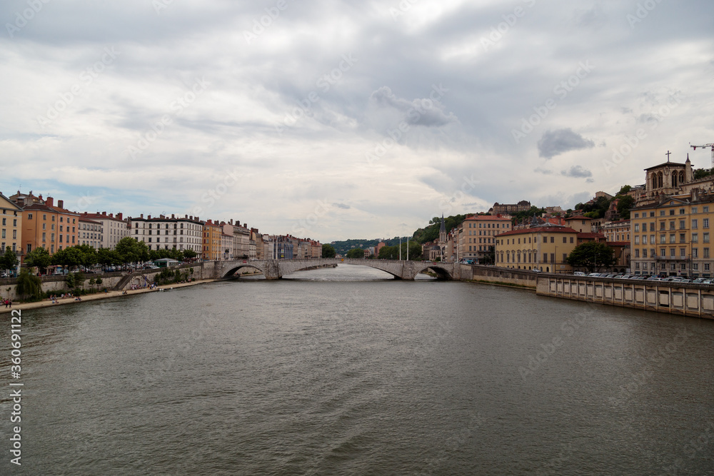 Lyon, France - CIRCA 2019: Picturesque historical Lyon Old Town buildings on the bank of Saone River. Lyon, Region Auvergne-Rhone-Alpes, France.