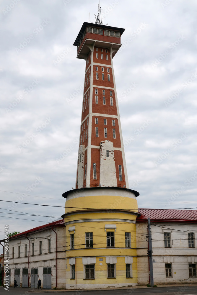 Old fire tower (monument of history and architecture of 19th century). Rybinsk, Yaroslavl Oblast, Russia.