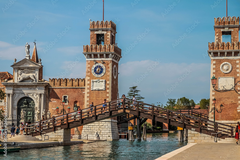 View of Rio de l'Arsenale and houses along a canal in Venice, Italy