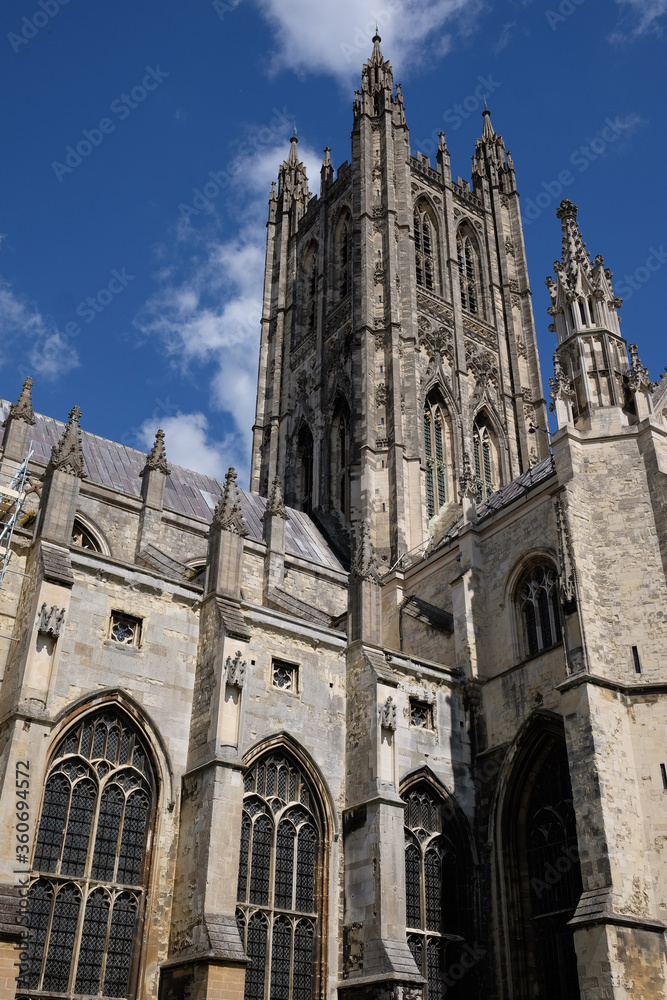 Fototapeta premium Canterbury Cathedral in early spring with blue sky and clouds