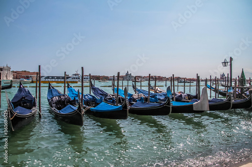 Gondolas moored by Saint Mark square in Venice, Italy