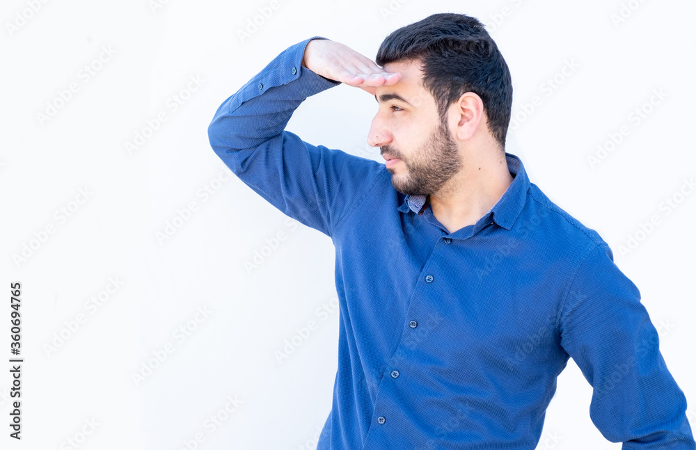 Arabic guy looking at something far away Arabic guy looking at something far away